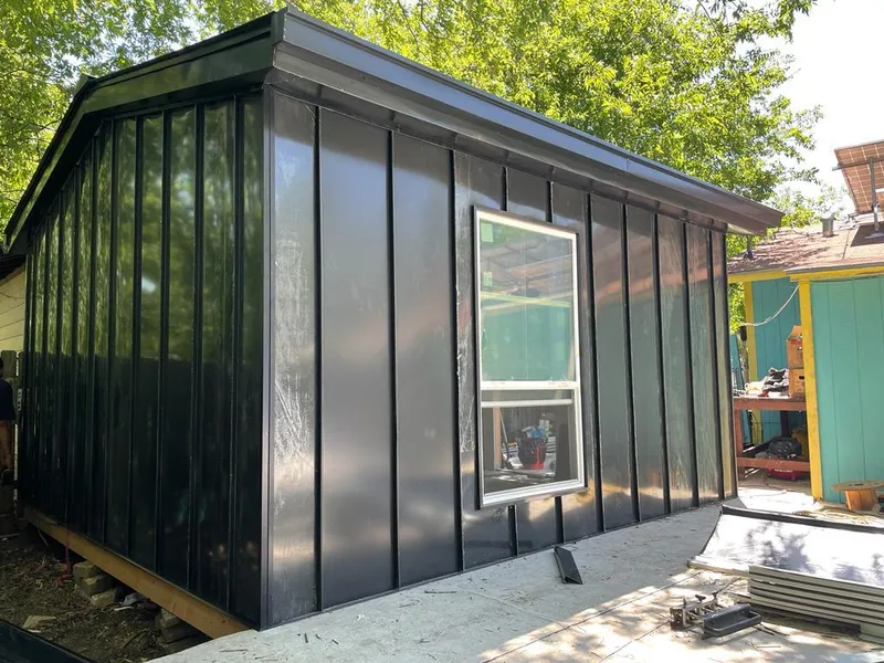 Black standing seam metal wall panels for Roof Inspection in Union City